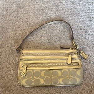Coach Gold Clutch with Elegant Design